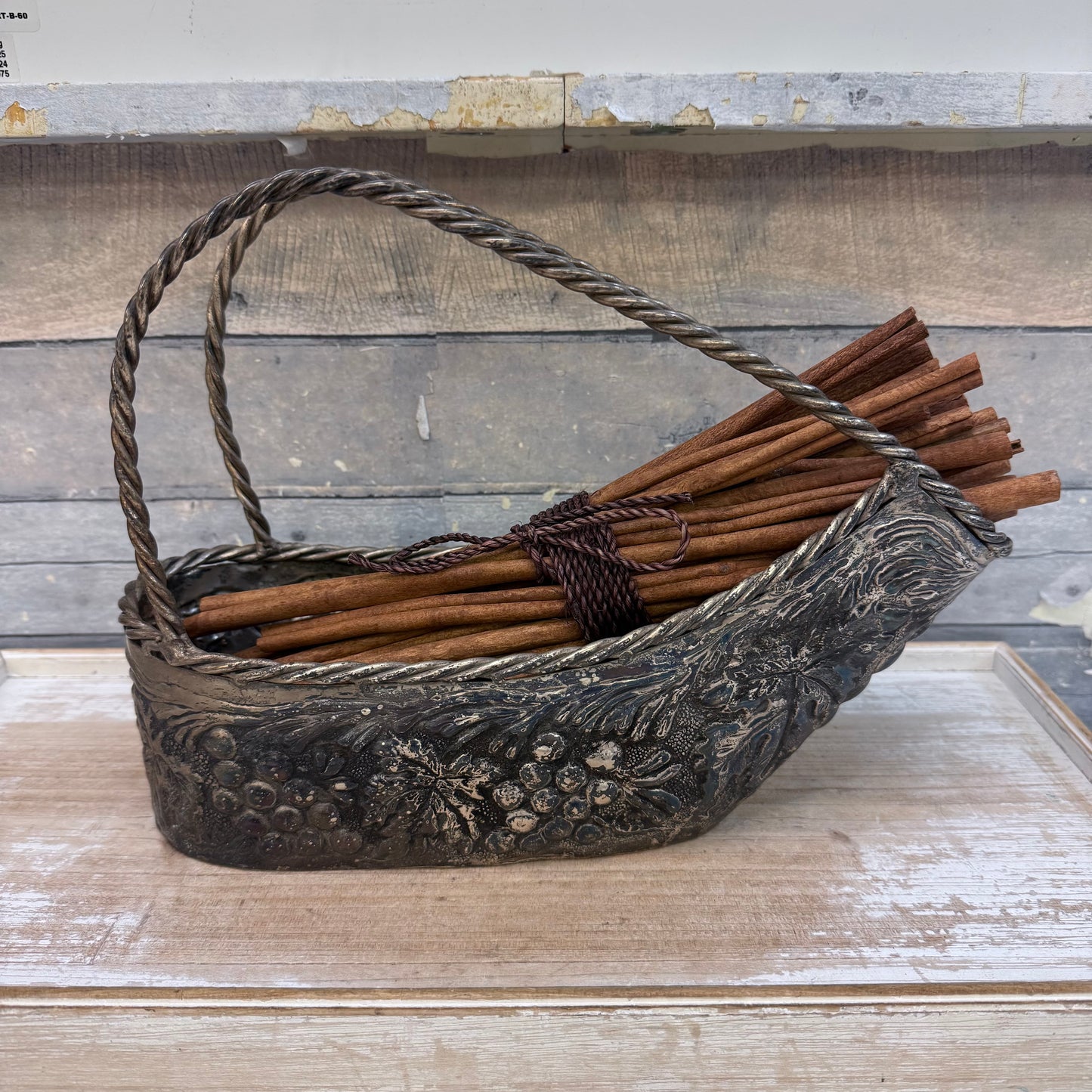 Cast Metal Embossed Basket with Cinnamon Stick Bundle