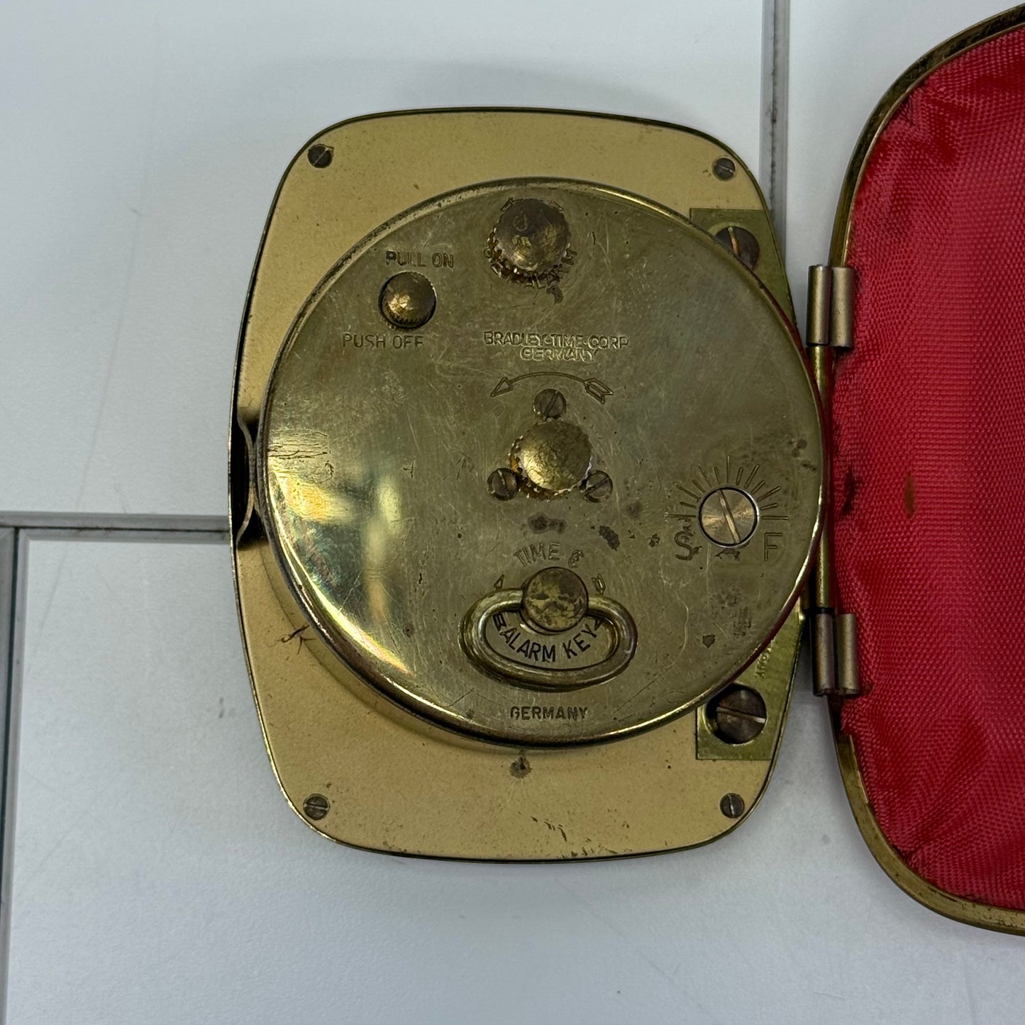 Bradley Mechanical Travel Alarm Clock in Red Leather Case