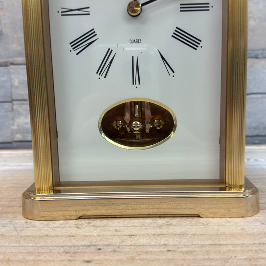 Howard Miller Brass Revolving Pendulum Quartz Table Clock