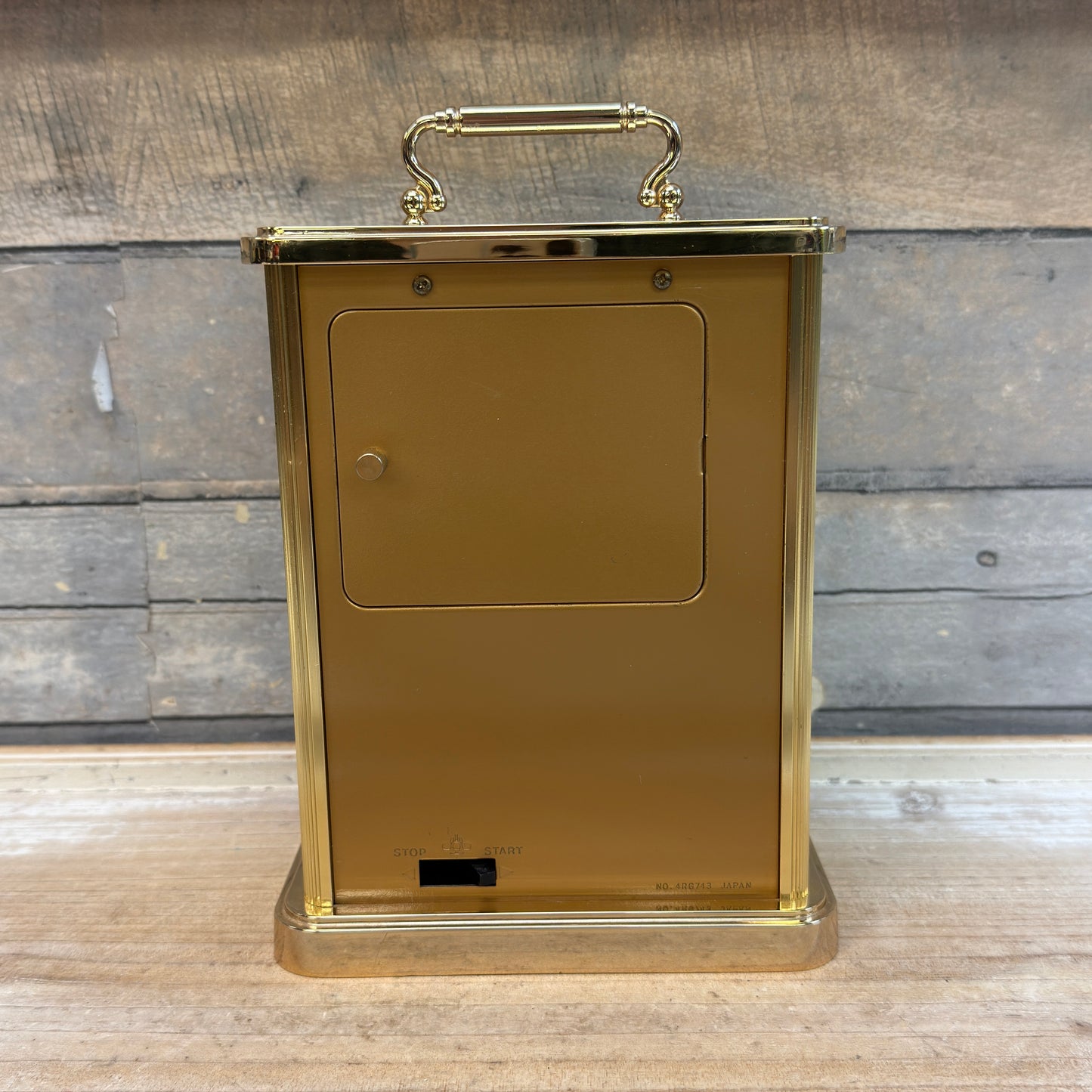 Howard Miller Brass Revolving Pendulum Quartz Table Clock
