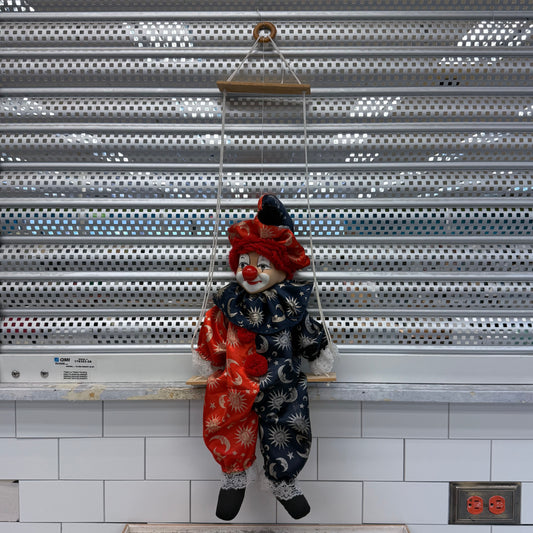 Hanging Clown Doll on Swing with Porcelain Face